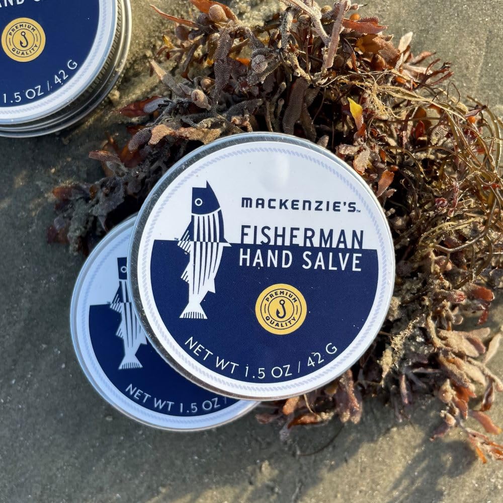 Sam's Natural tin beside fishing gear illustrating outdoor use and protection for hardworking hands