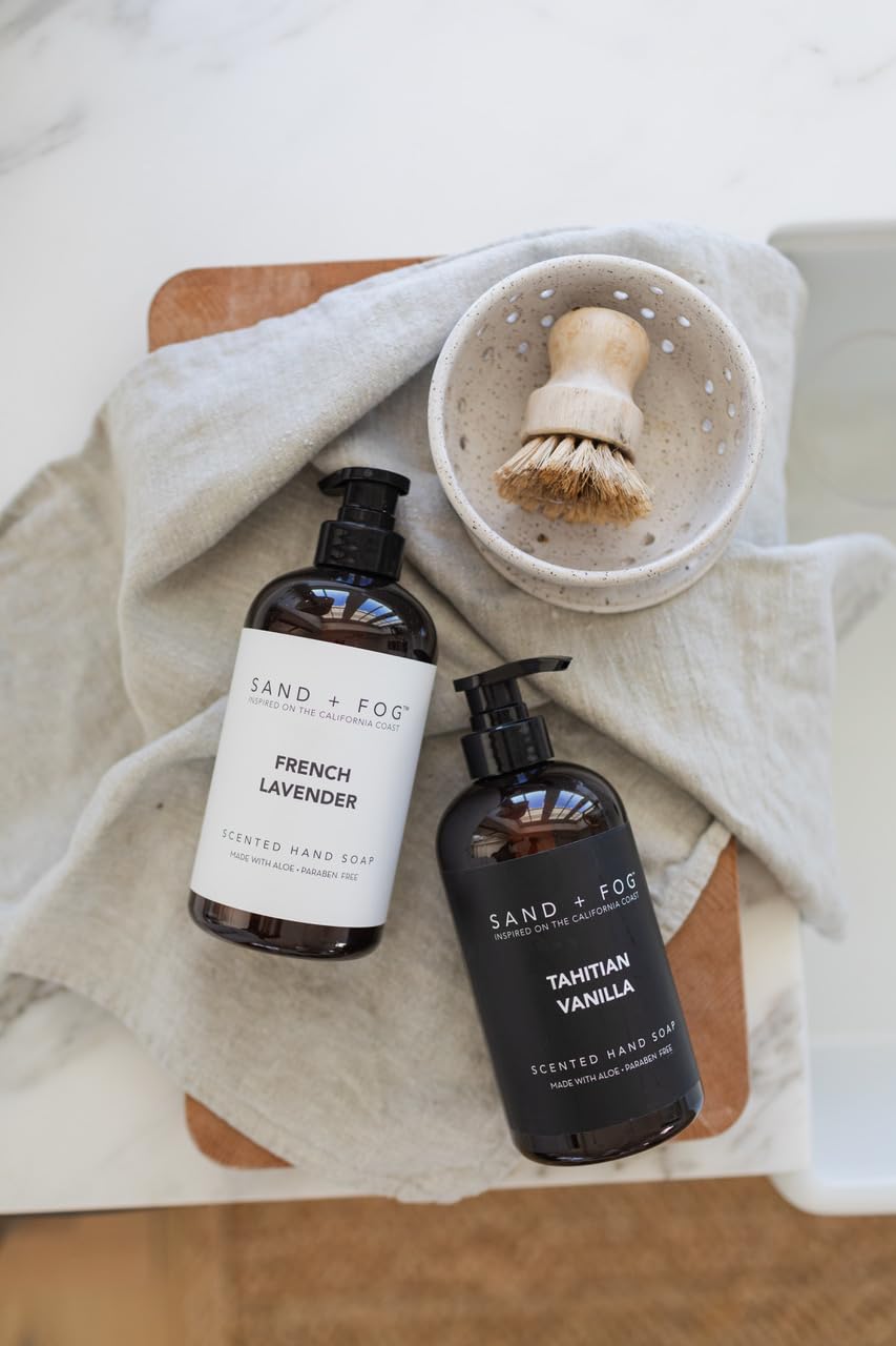 Sand + Fog bottle beside sink showing 20 oz scale and family-friendly capacity