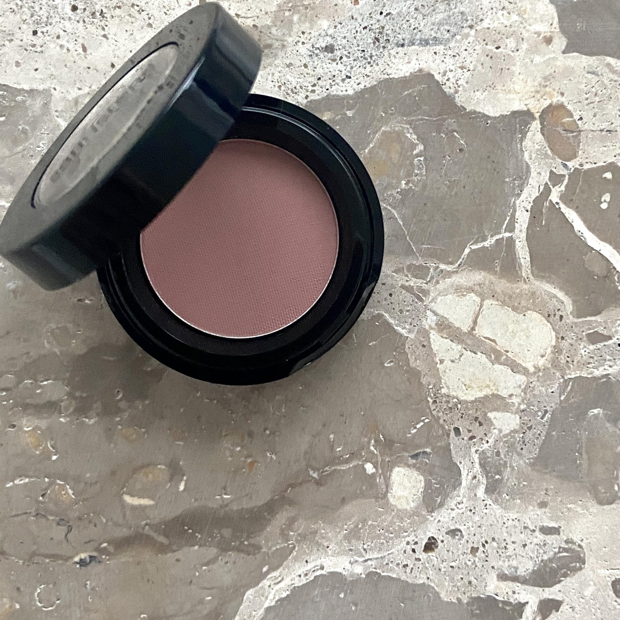 Sandstone Scandinavia 414 Light Rose size comparison next to coin demonstrating compact portability