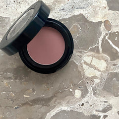 Sandstone Scandinavia 414 Light Rose size comparison next to coin demonstrating compact portability