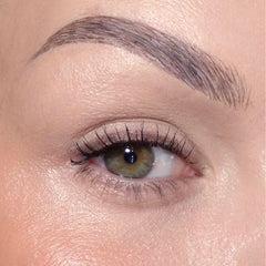 Sandstone Scandinavia cinnamon swatch on skin showing metallic warm sheen
