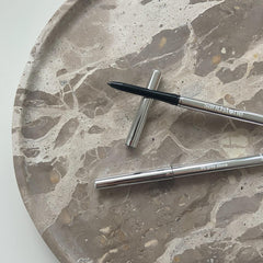 Sandstone Scandinavia eyeliner applied to eyes demonstrating defined metallic finish