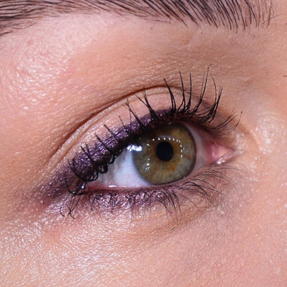 Sandstone Scandinavia color stroke on skin showing aubergine pigment payoff and long-wear benefit