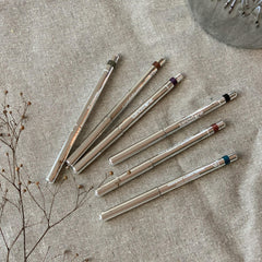 Sandstone Scandinavia swirled eyeliner stroke showing metallic finish and smooth payoff