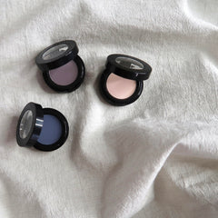 Sandstone Scandinavia eyeshadow 262 on vanity with accessories showing daily-use styling benefit: effortless routines
