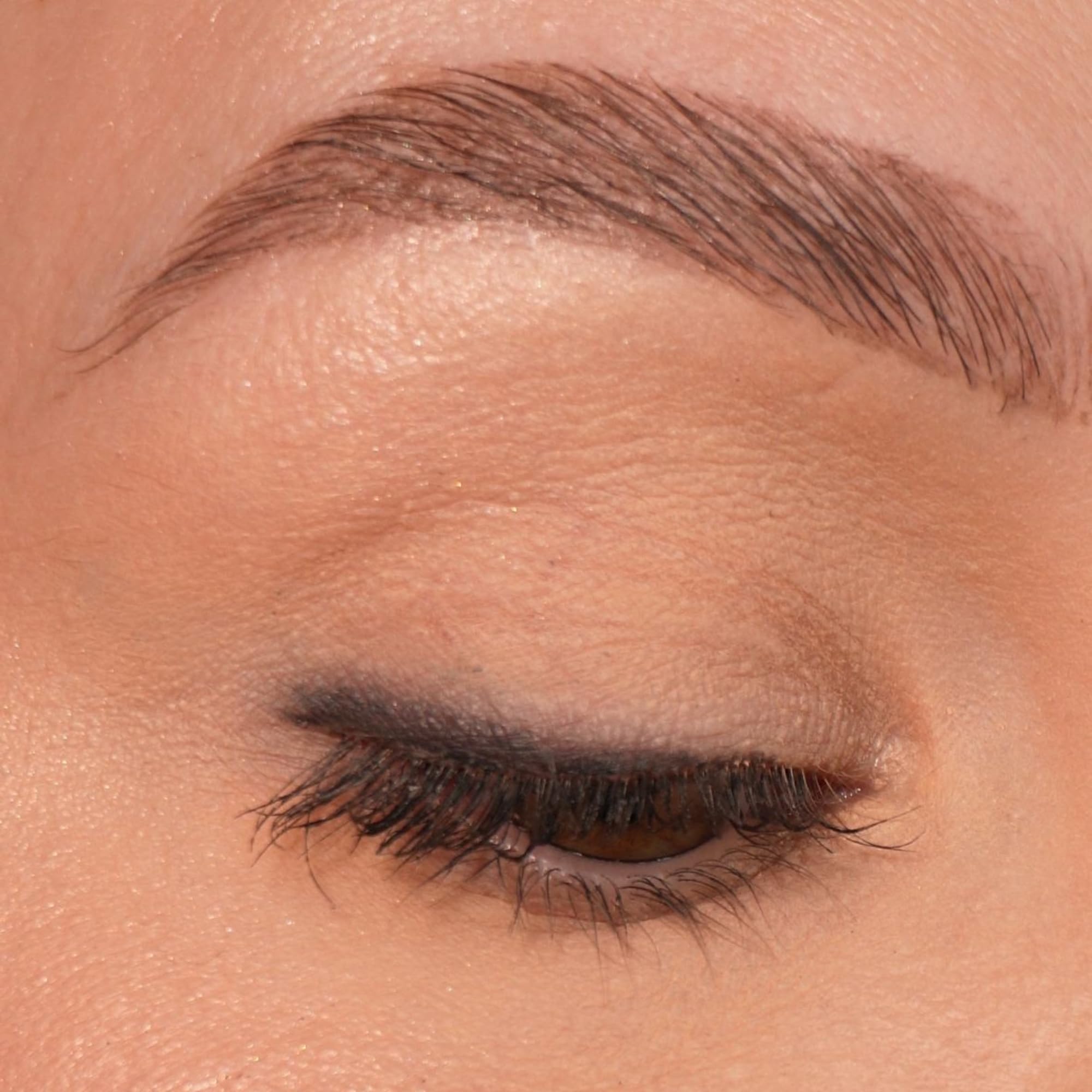 Sandstone Scandinavia black swatch on skin showing creamy texture and intense pigment payoff