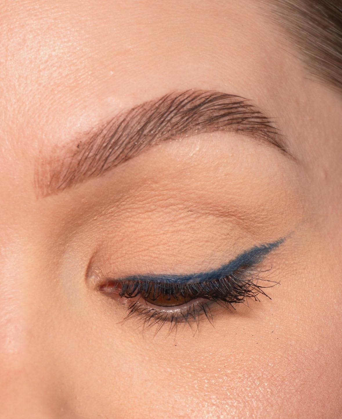 Sandstone Scandinavia texture stroke on skin showing rich blue pigment payoff