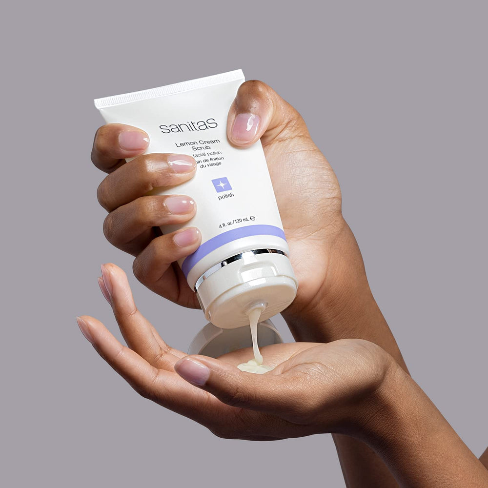 Sanitas lemon cream scrub in hand demonstrating gentle application and hydration