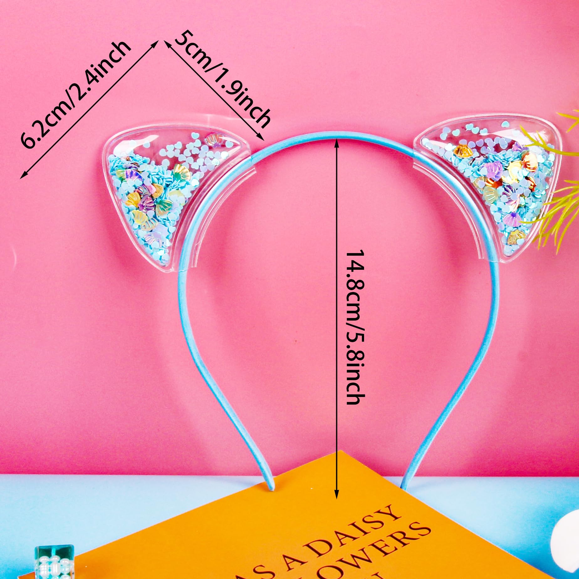 Santoddle close-up of transparent ear sequins highlighting playful shimmer