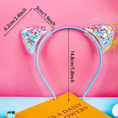 Santoddle close-up of transparent ear sequins highlighting playful shimmer