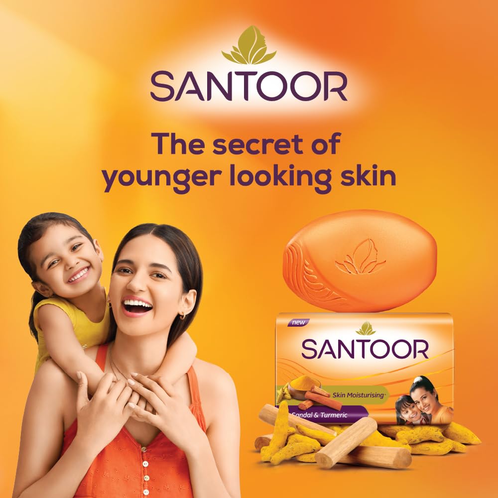Santoor sandal and turmeric soap producing foam in hand for gentle cleansing benefit