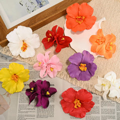SAOROPEB flower clipped in a side bun for beach-ready boho styling