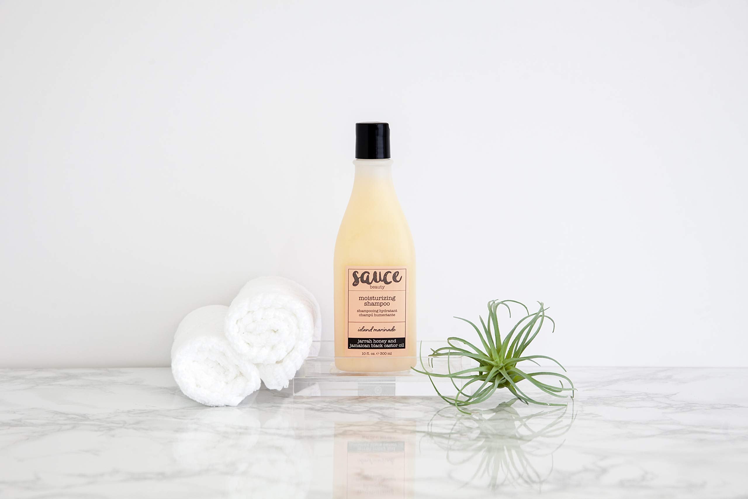SAUCE BEAUTY Jamaican black castor oil close-up illustrating nourishing oil