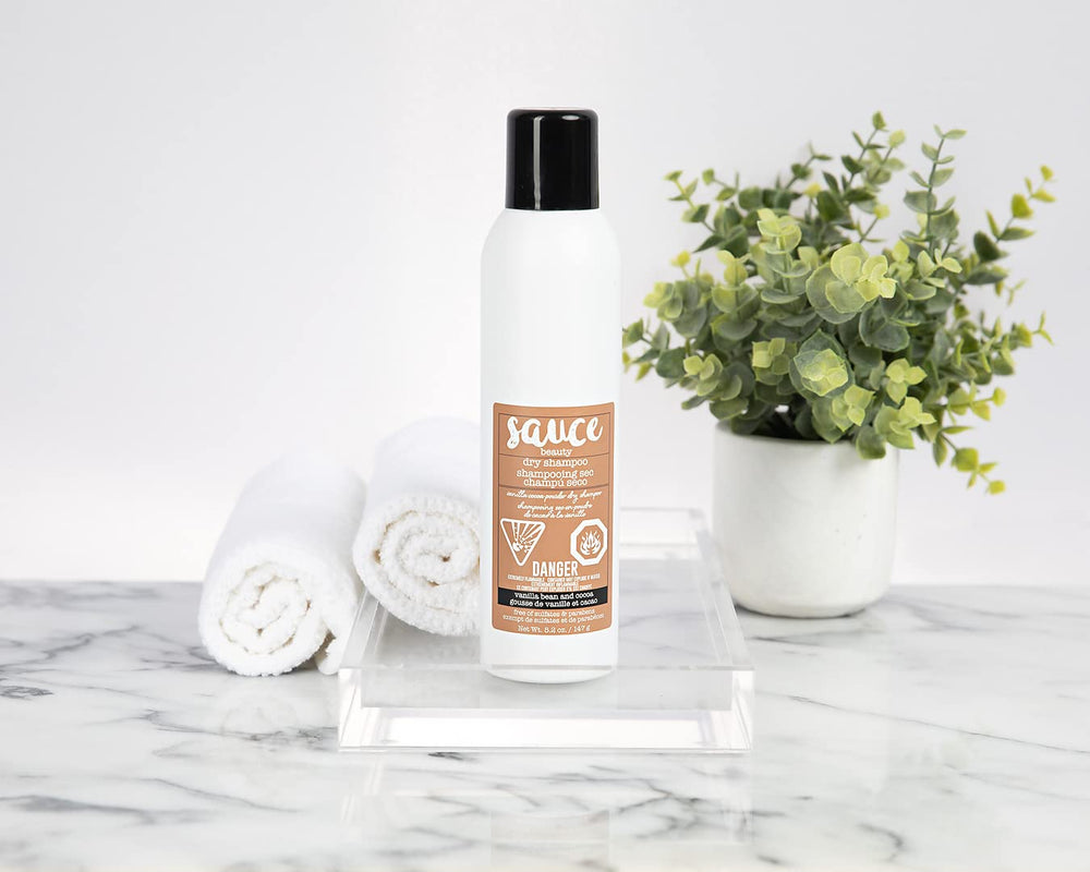 SAUCE BEAUTY curly hair showing moisture, definition and bounce