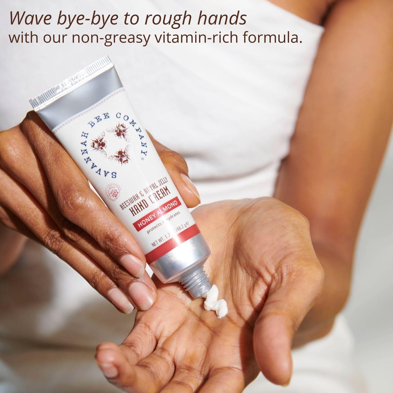 Savannah Bee Company hand cream being applied for instant softening benefit