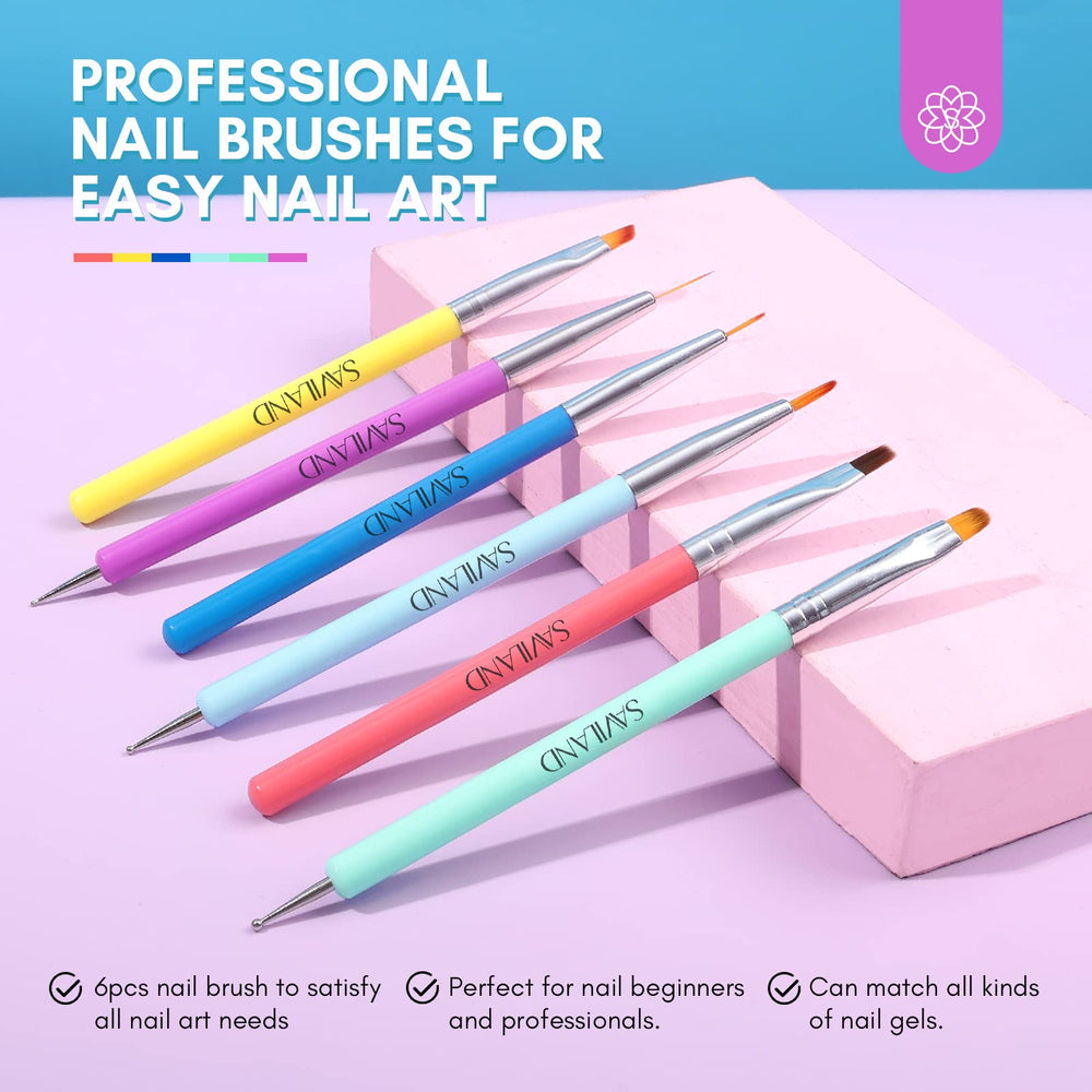 SAVILAND brushes laid out showing colorful handles and variety for precision work