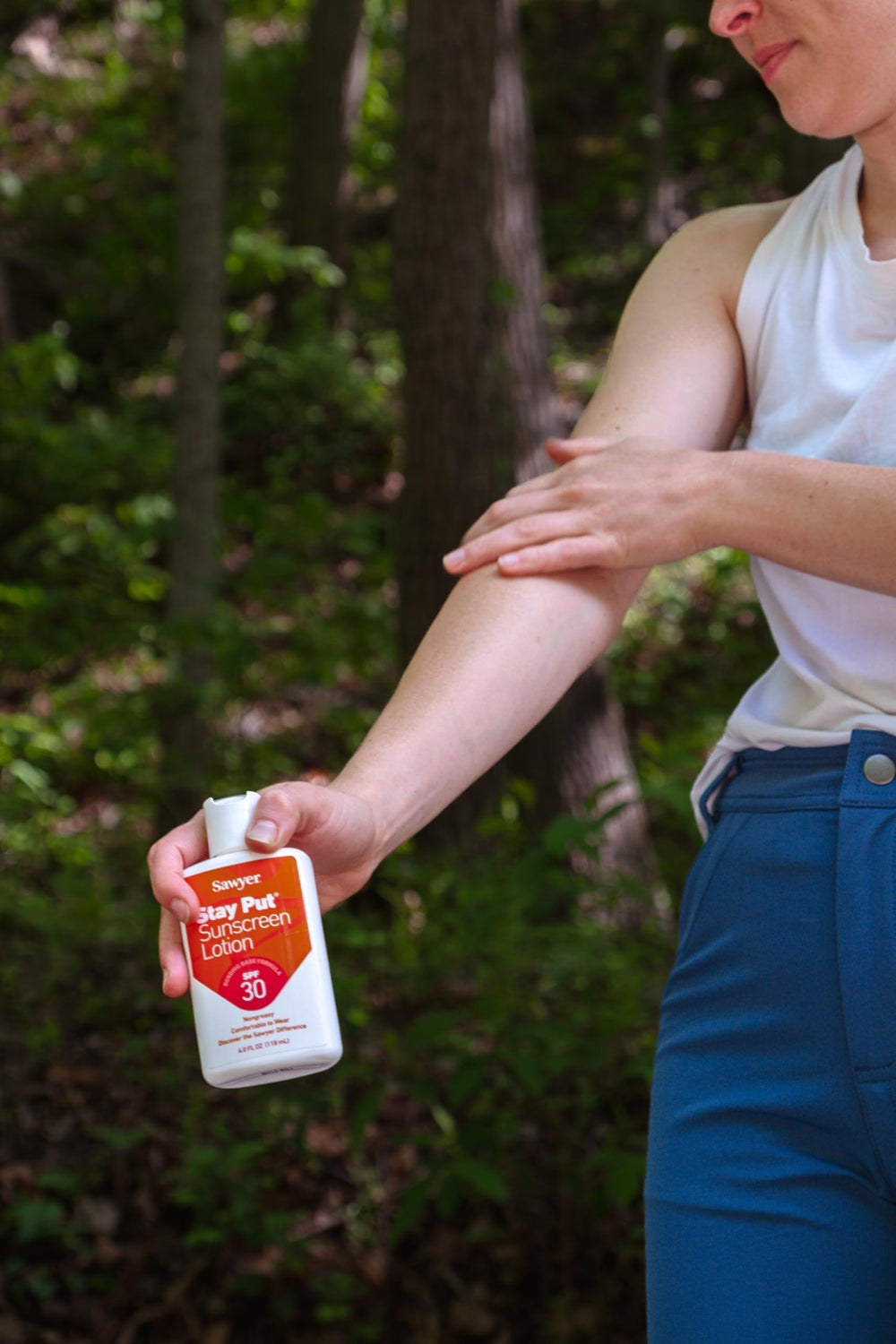 Sawyer lotion texture on hand showing non-greasy spreadability