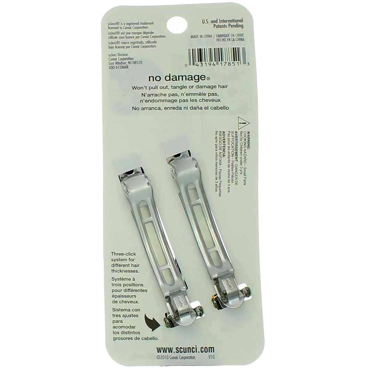 Scunci barrette beside a coin showing compact size and easy portability advantage