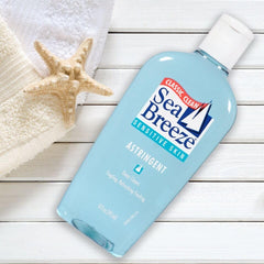 Seabreeze used by person applying toner illustrating soothing hydration benefit