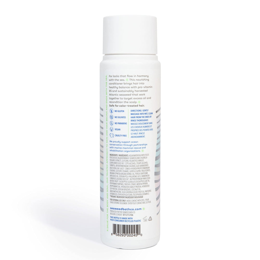 Bathroom countertop scene with Seaweed Bath Co. conditioner as part of a daily hair care routine