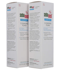 SEBAMED bottle beside hand for scale and travel-friendly size