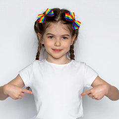SeBneny bow clipped in ponytail demonstrating quick styling and visual pop