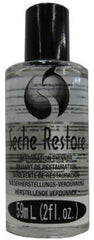 Close-up of Seche cap and pour tip with a drop, brand enables precise thinning