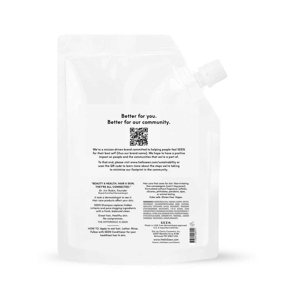SEEN eco-refill being poured into pump bottle for easy refill and waste reduction