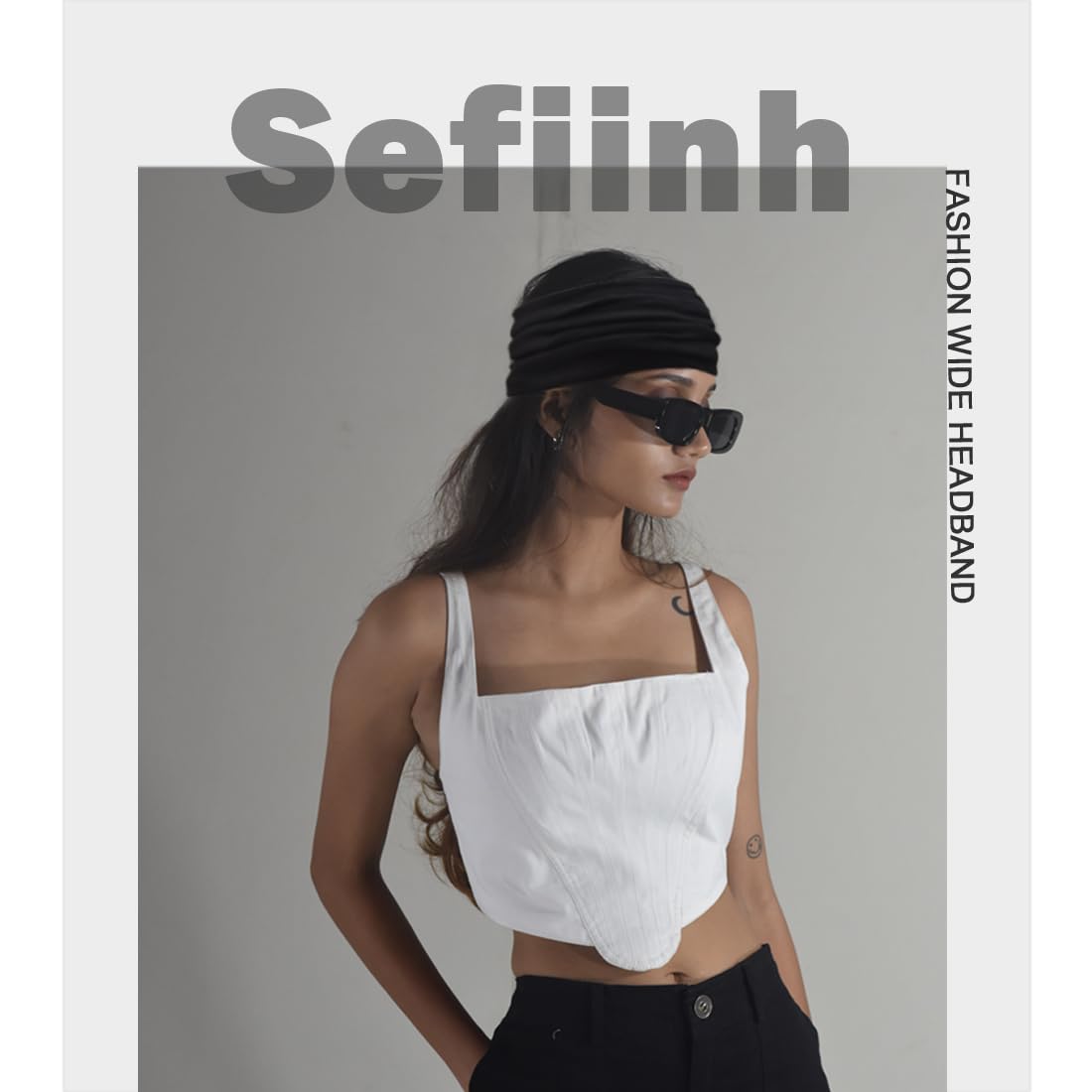 Sefiinh headband held in hand indicating size and one-size-fits-most fit