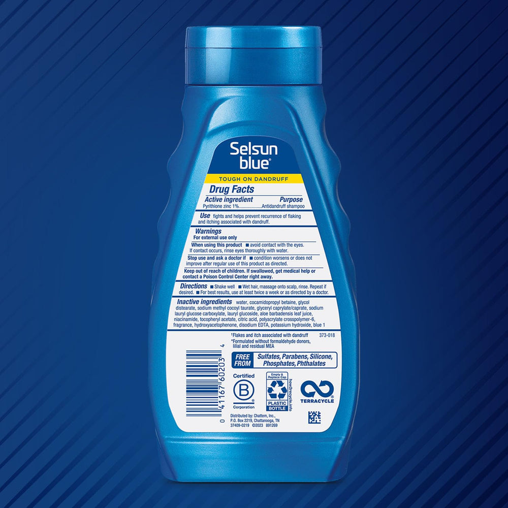 Close-up of Selsun Blue label highlighting active ingredient and benefits