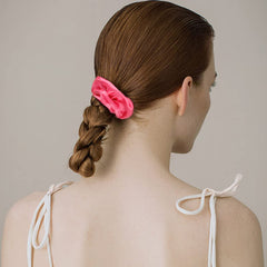 Semato scrunchie next to ruler displays accurate size and one-size-fits-most benefit