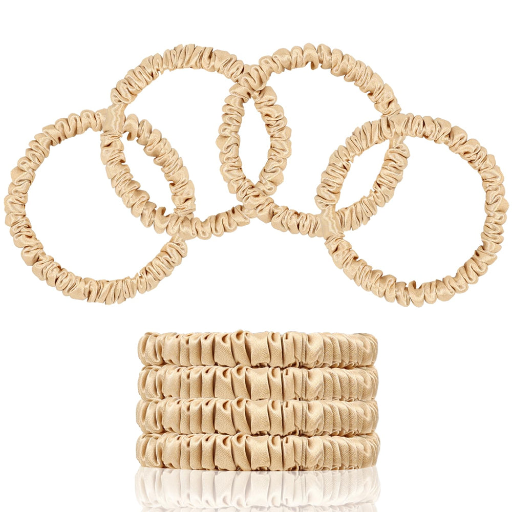 SEMRUE front view of four champagne gold silk scrunchies showing neat packaging and luxury appeal