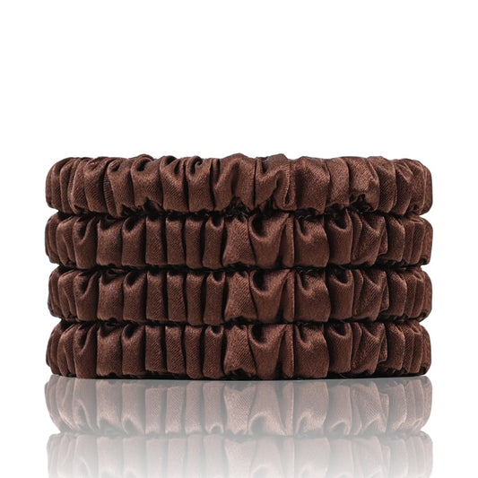 SEMRUE front packaging box showing four brown silk scrunchies, gift-ready