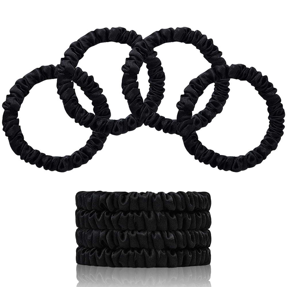 SEMRUE front packaging showing four black silk scrunchies, elegant gift-ready presentation