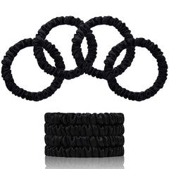 SEMRUE front packaging showing four black silk scrunchies, elegant gift-ready presentation