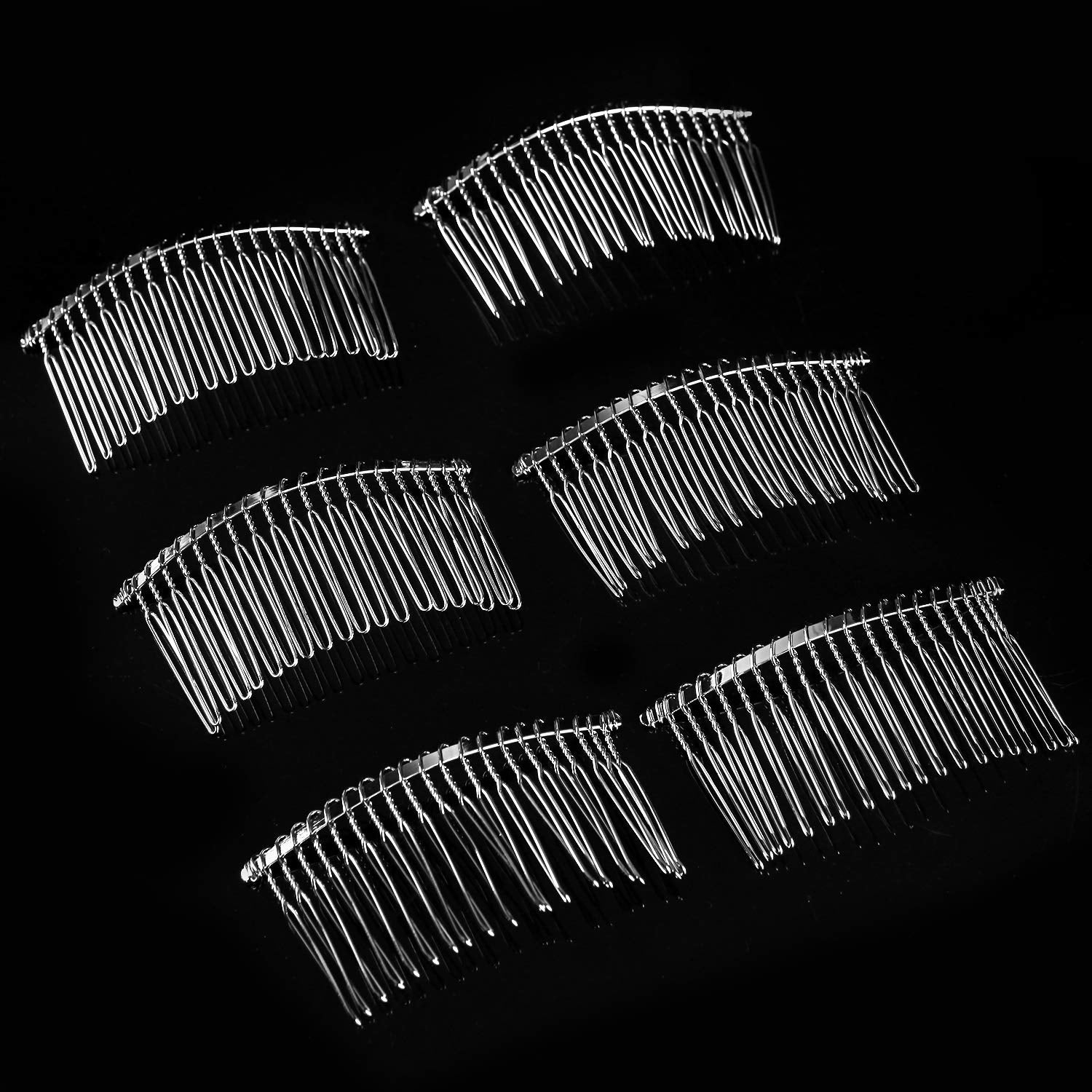 senkary comb in bridal updo demonstrates stable veil attachment