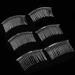 senkary comb in bridal updo demonstrates stable veil attachment
