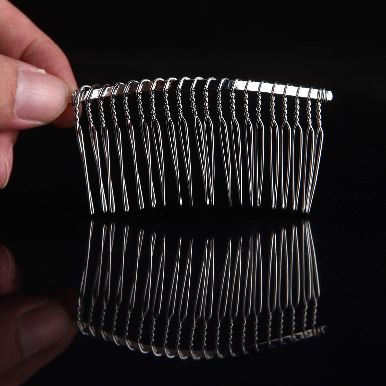 senkary comb size comparison in hand illustrates scale and portability