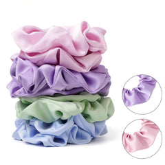 SEVEN STYLE flat lay of eight pastel scrunchies showing color variety for styling