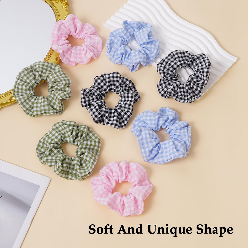 SEVEN STYLE scrunchie held in hand to show 4.2-inch scale and oversized look