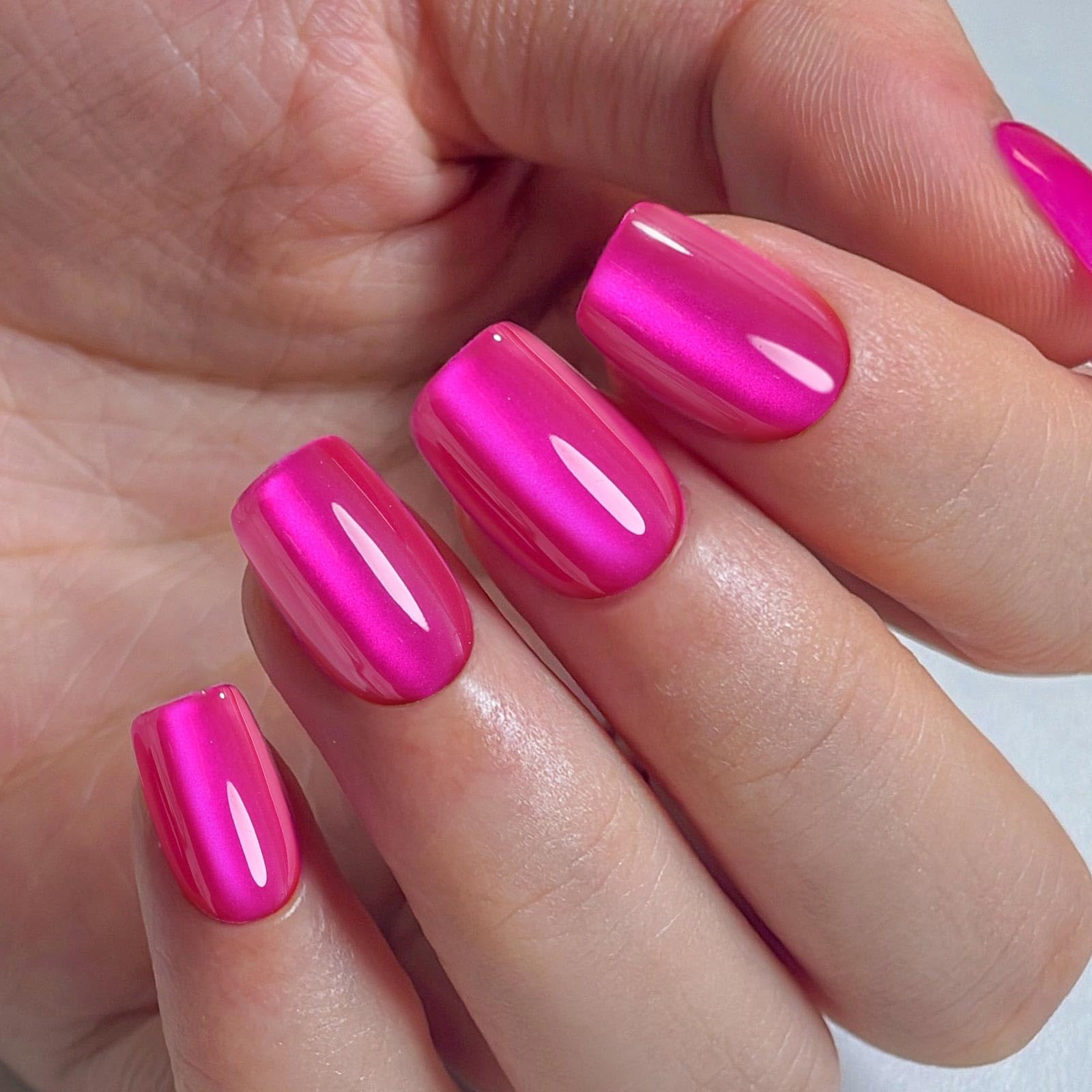 SHANGMENG lifestyle shot at party highlighting striking hot pink manicure impact