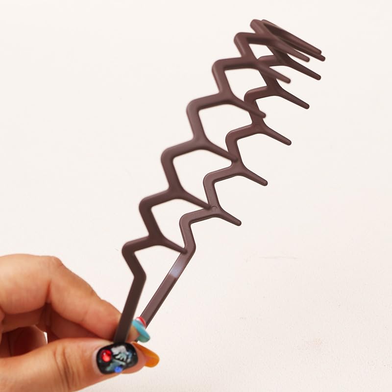 SHE LIAN headband beside a hand to show average size for most adult heads