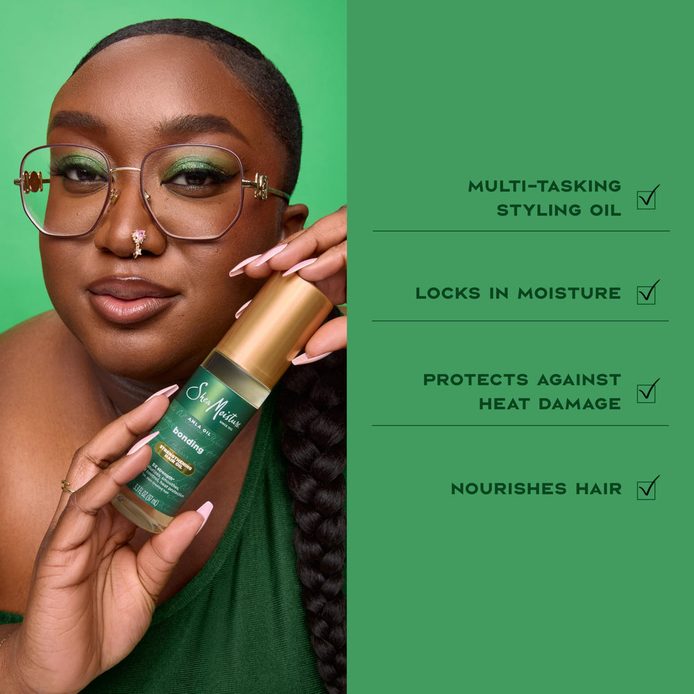 Shea Moisture being smoothed into hair ends to reduce frizz and add shine during styling