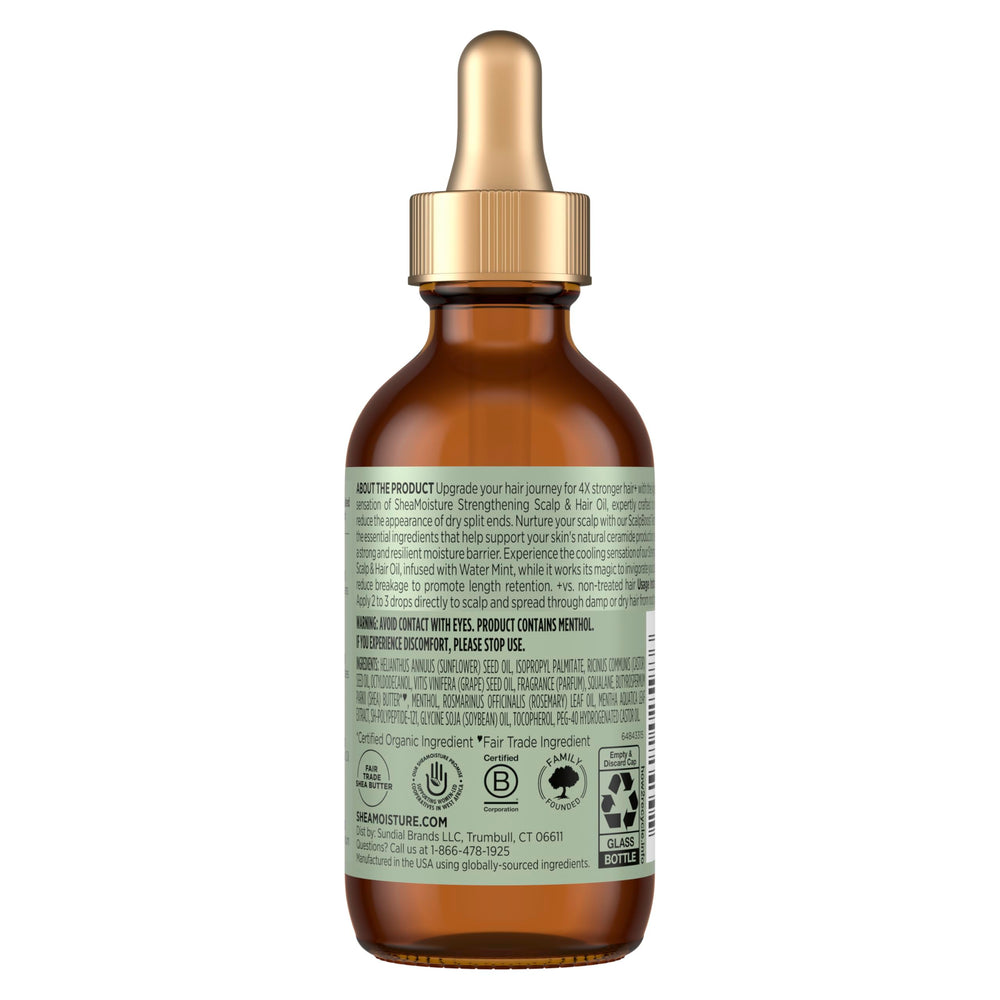 Shea Moisture dropper dispensing oil demonstrating precise application control