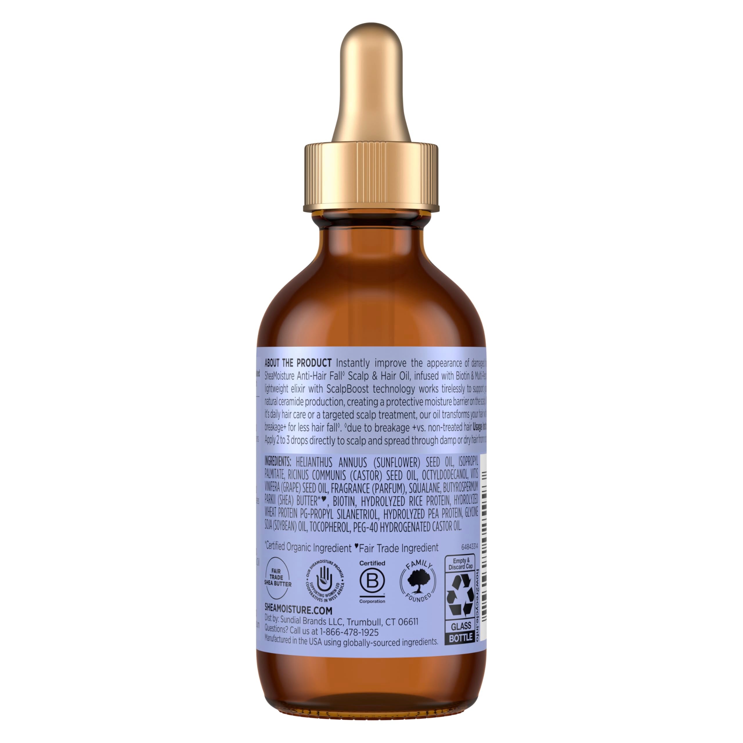 Shea Moisture oil texture on hand highlighting lightweight absorption