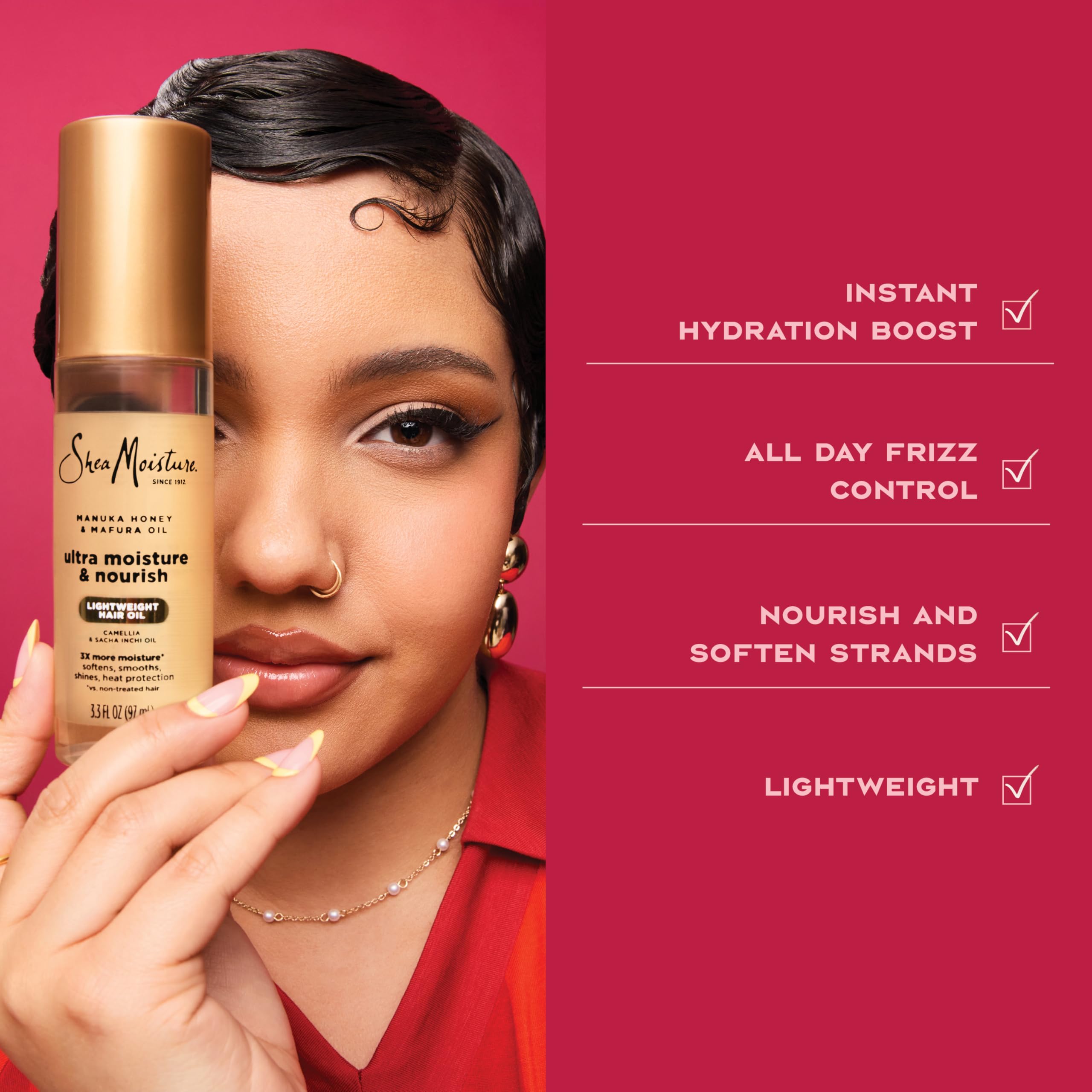 Shea Moisture ingredients display with oils, emphasizes nourishing botanical blend