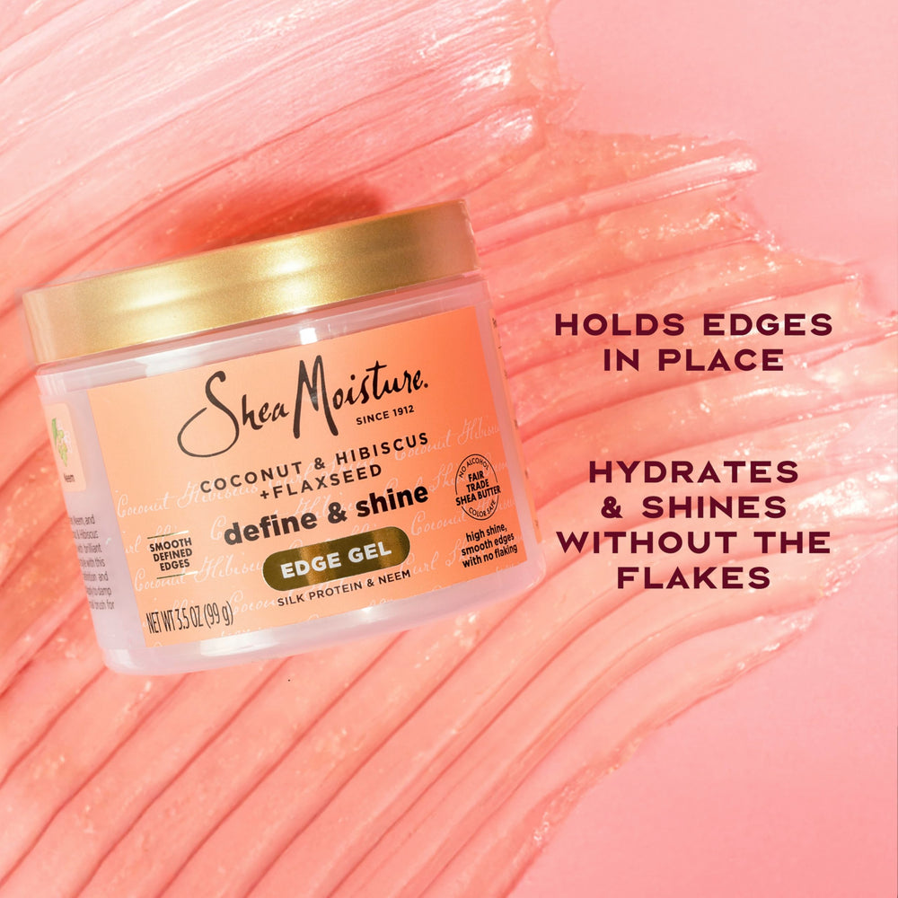 Shea Moisture 3.5 oz pot held in hand to show compact travel size