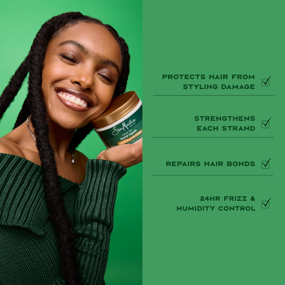 SheaMoisture applying leave-in to damp hair for detangling
