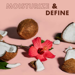 SheaMoisture child applying cream to curls for easier styling