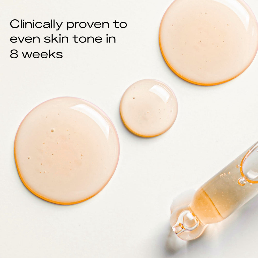Shea Moisture serum bottle staged with moisturizer showing layering routine